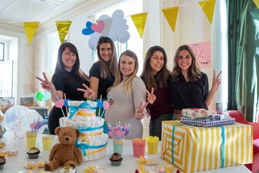 pregnant woman and her friends at a baby shower