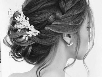 women with a UP DOS FOR a  WEDDING done by one of the best salon in town