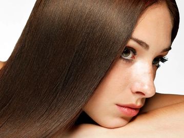 a women with the keratin done at a premier hair salon in west palm beach