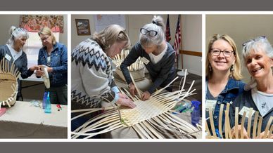 Two women collaboratively weaving a basket in a workshop setting.