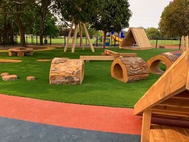 Artificial grass installation at kids playground