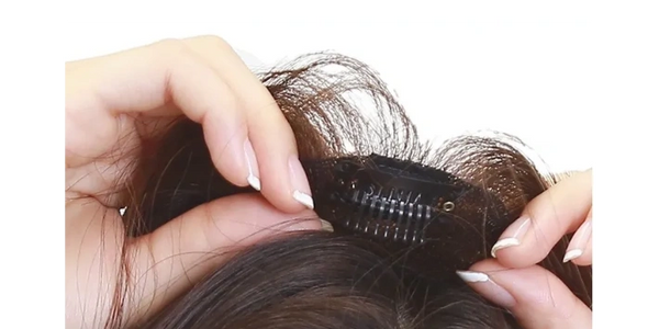 Clip to secure the hair piece