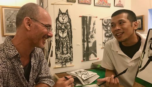 Learning sumie - ink brush painting - at Toyokuni Atelier Gallery, Jimbōchō, Tokyo, Japan