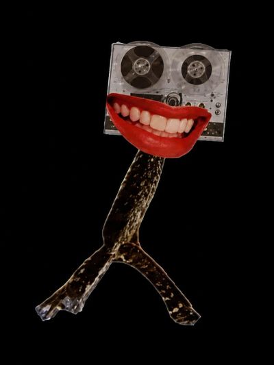 Surreal figure with a tape recorder head and large smiling mouth.