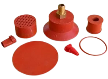 Set of red rubber suction cups and attachments for dent repair.