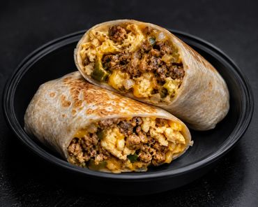 Chorizo, onions, peppers, scrambled eggs, and cheese wrapped in a toasted flour tortilla