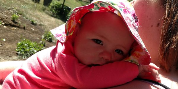 Enjoying the sun with a hat for shade!