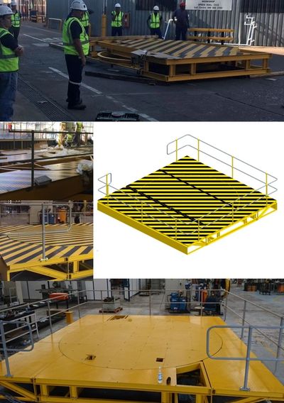 Workers assembling a large yellow industrial platform with safety railings and black stripes.
