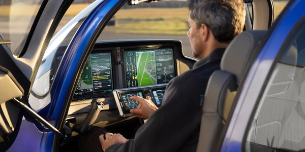 A man operating the internal system of flight