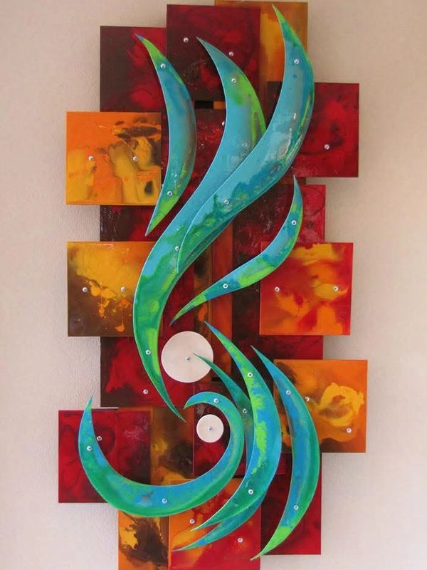 Abstract wall art with green-blue curves on fiery red and orange blocks.