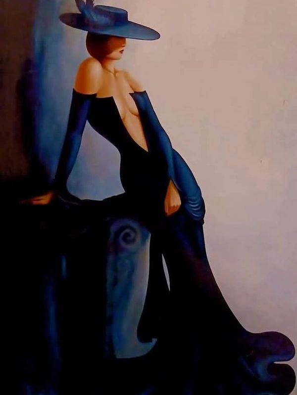 Elegant woman in a deep blue gown and feathered hat poses gracefully.