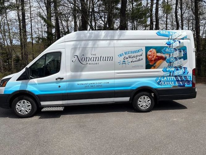 A container filled with sharpened colored pencils in various hues.