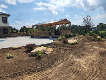 Hardscape design landscape lay out plants mulch stone back yard transformation