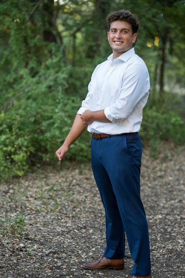 Guy in dress clothes smiling