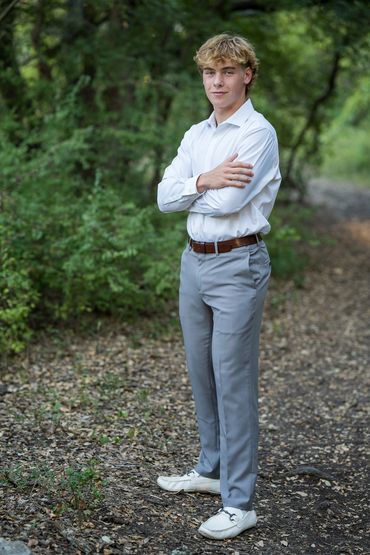 High school guy with arms crossed