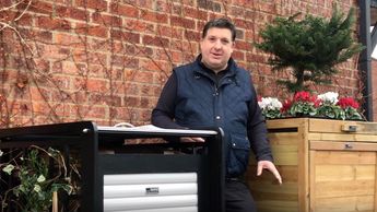 hide your ugly plastic garbage cans by nature's own plants and flowering climbers wheelie bin gone