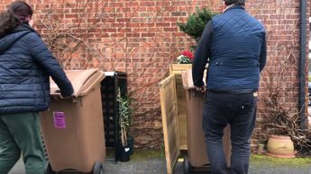 The wheelie bins easily roll into and out of the Bin Store Invention. The correct way around