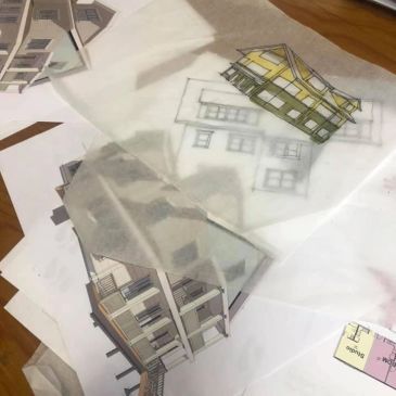 Architectural sketches of buildings on tracing paper.
