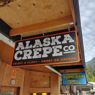 Alaska Crepe Co. Hanging Sign