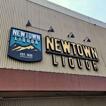 Newtown Liquor Building Sign