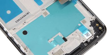Close-up of a disassembled smartphone's internal frame and connectors.