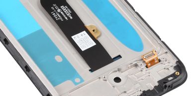 Close-up of a smartphone internal frame with flex cable and connectors.