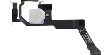 A black flexible circuit cable with connectors and a white component.
