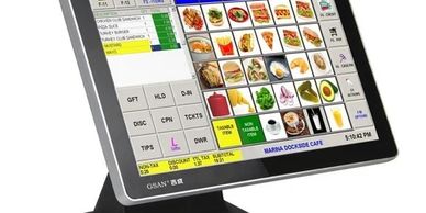 Touchscreen point-of-sale system displaying food menu and order summary.