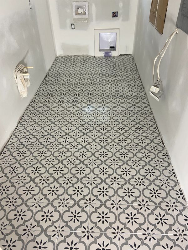 Laundry floor tile