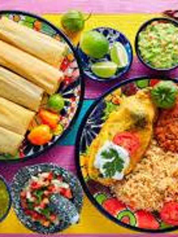 A picture of different dishes and salads placed in bowls