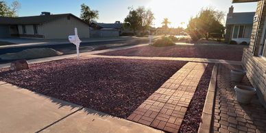 Clean front yard design with durable and easy-care gravel