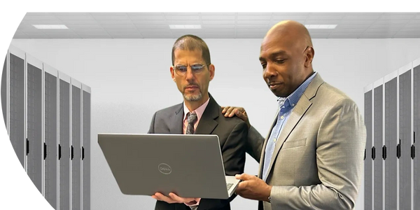 Business owners discussing strategies to optimize businesses and ensure cyber security essentials.