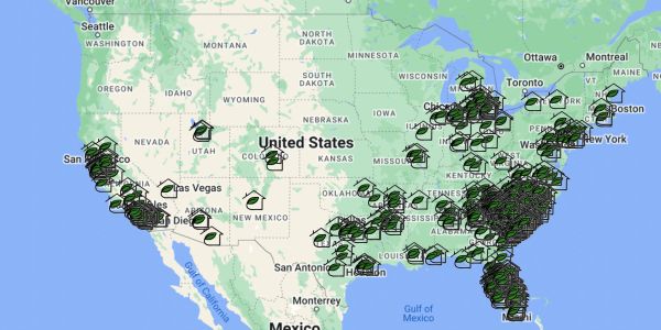 Map of the United States with multiple green house icons.