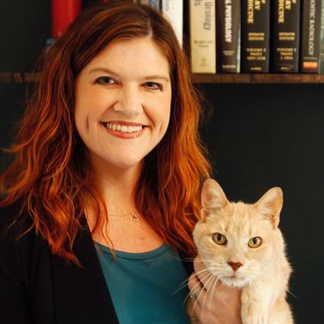 Dr. Autumn McBride holding a cat