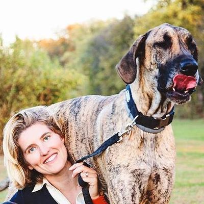 Founder, Amy Miller with her pet great dane. 