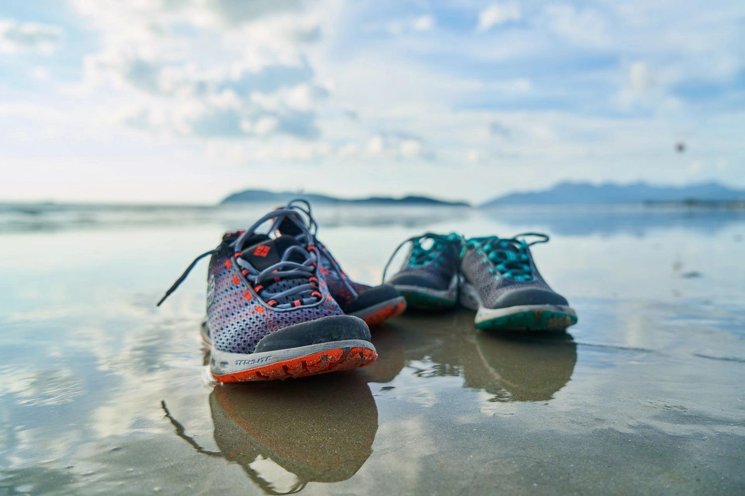 Running shoes on the beach