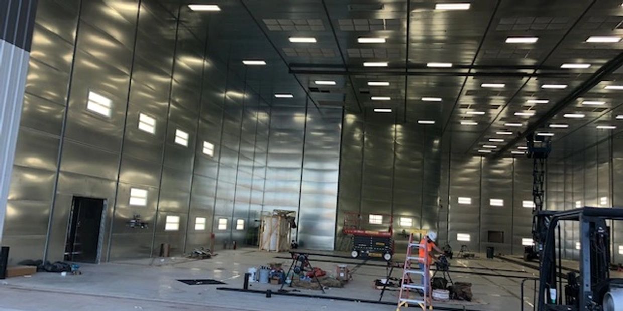 Commercial Drywall & Framing
interior photo  of large metal corporate office building and warehouse 