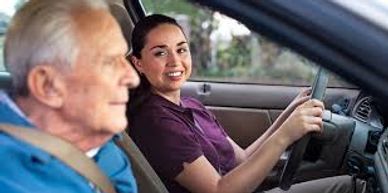 A woman driving older man