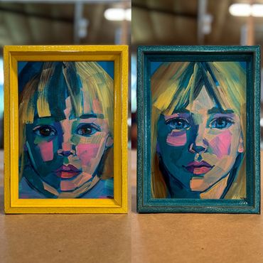 Two colorful painted portraits with yellow and teal frames 