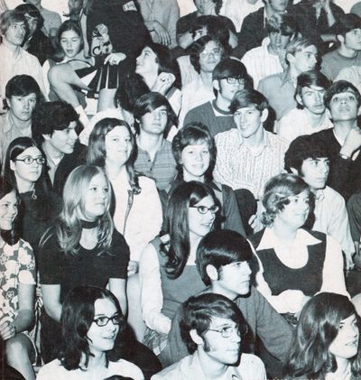 Black and white photo of a large group of young people, likely students, seated and posing for a group picture.