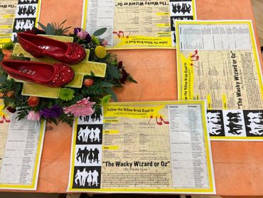 High school one act play placements for table decorations.