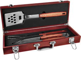 A custom barbecue set inside a piano finish case with room for a laser engraved message.