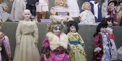 Vintage china head dolls in the Doll House at Har-Ber Village Museum.