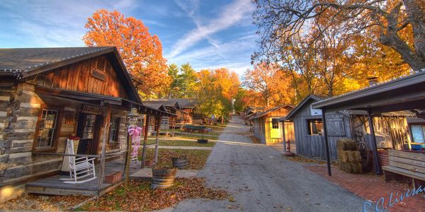 RC Livesay photograph of Har-Ber Village's Main Street in the fall.