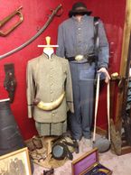 Confederate uniforms in Military Exhibit at Har-Ber Village Museum.