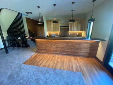 Bar lighting with under cabinet lighting and pendants.