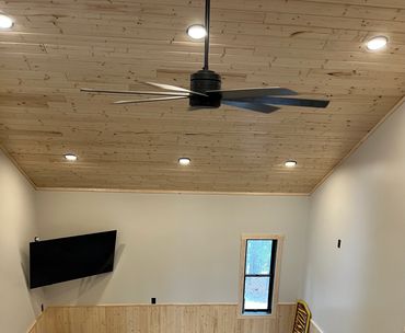 Recessed lighting and fan with a down rod.
