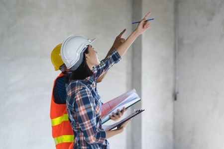 home inspector pointing out defects