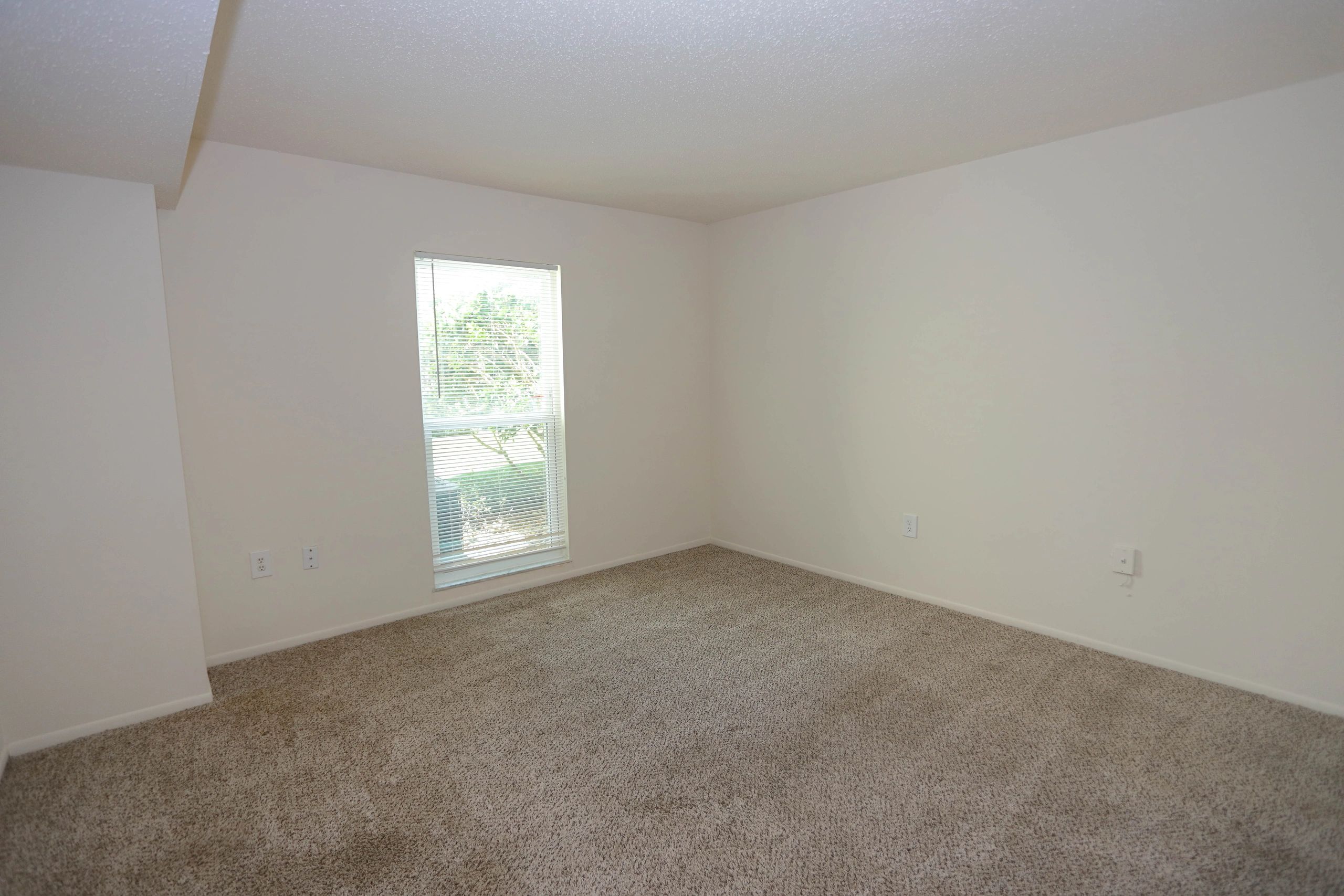 First floor bedroom with carpet.