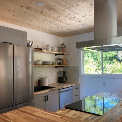 Brand new fully stocked kitchen at the Vacation rental on Vancouver Island called the Surf Chalet.